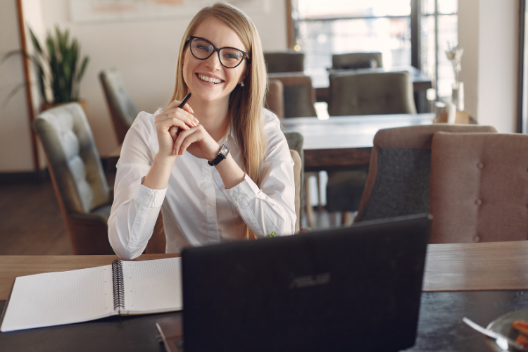 image of a woman working at a marketing agency