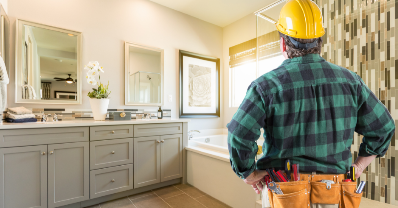 Leads for contractors, image of a handyman looking at a kitchen