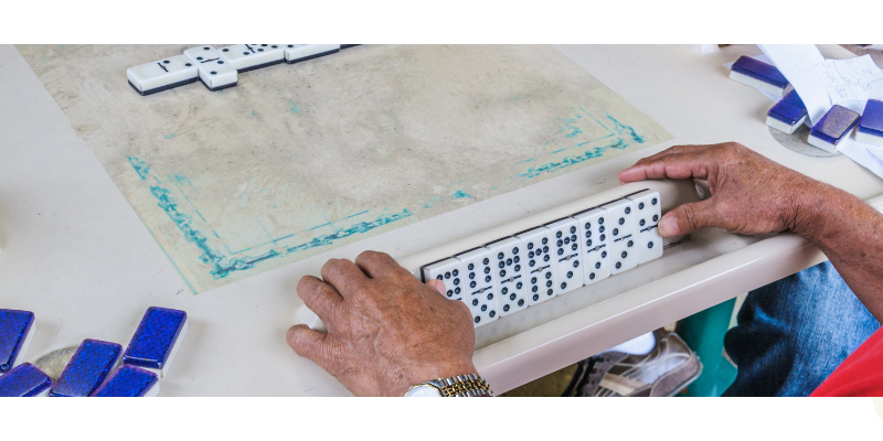 marketing solutions for Miami businesses. Guys playing dominoes in Miami